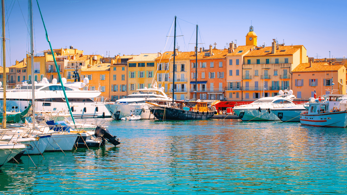 Yachts berthed together in a busy marina
