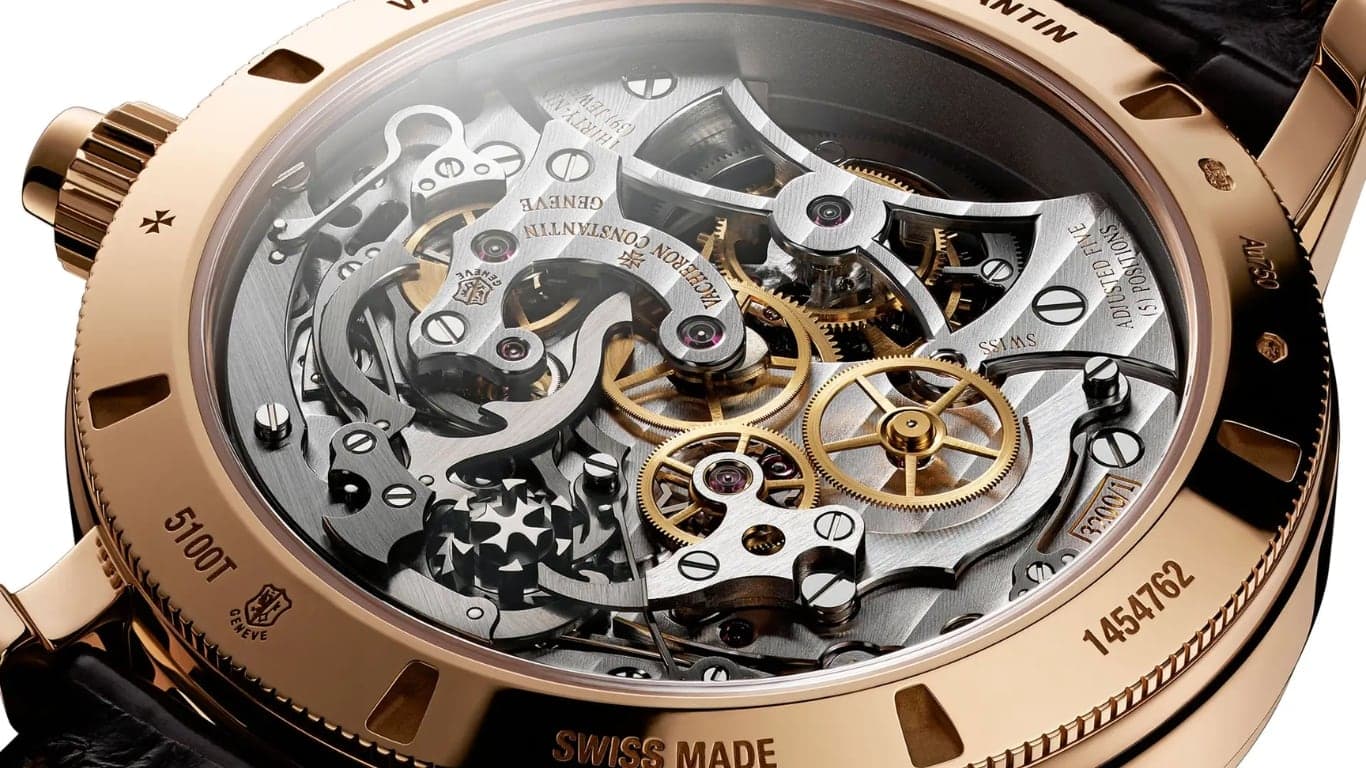 A rose gold Vacheron Constantin movement, finely finished and visible through the caseback.