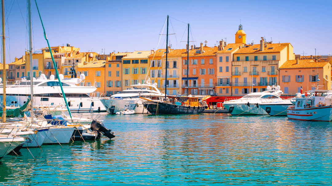 Yachts berthed together in a busy marina