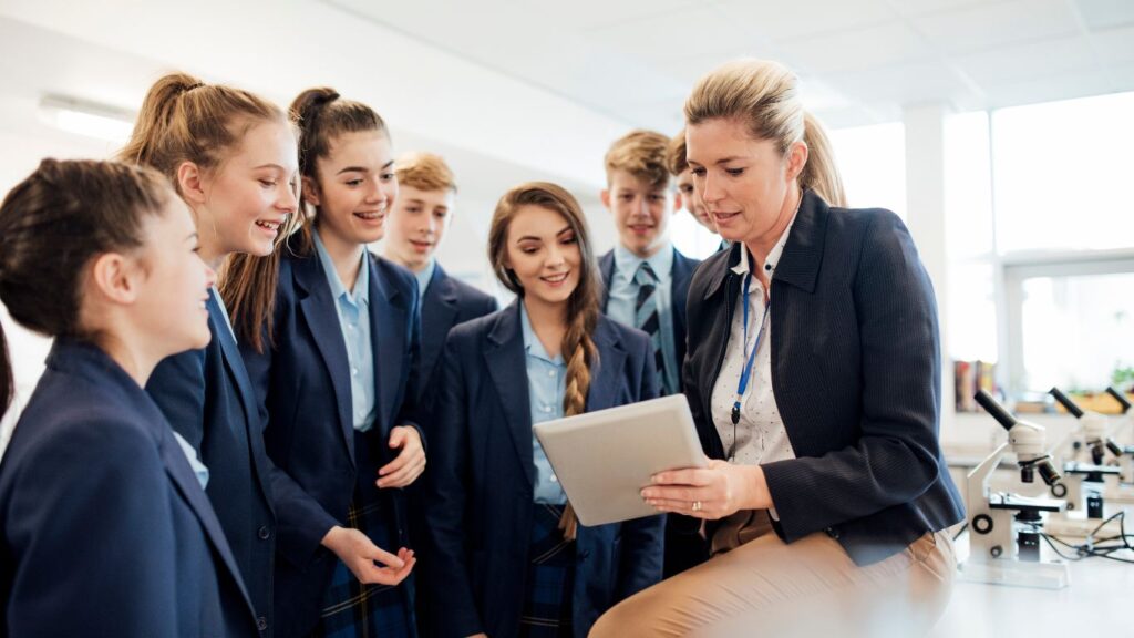 London school teacher with her students